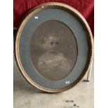 English School: 19th cent. Oval pastel portrait of a young girl wearing a white dress, framed and