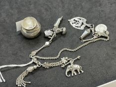 Hallmarked Silver: Charm bracelet to include elephant, teapot, Egyptian figure, whistle etc. 1.