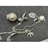 Hallmarked Silver: Charm bracelet to include elephant, teapot, Egyptian figure, whistle etc. 1.