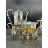 Hallmarked Silver: Victorian four piece tea/coffee set pierced body and engraved with leaf and