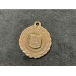 Hallmarked Gold: 9ct gold presentation long service award medal. Weight 10g.