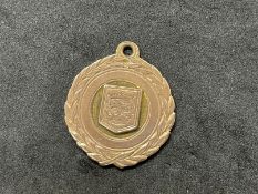 Hallmarked Gold: 9ct gold presentation long service award medal. Weight 10g.