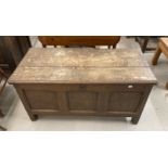 Late 18th cent. Oak coffer the two plank top with moulded edge to the front. The front with three