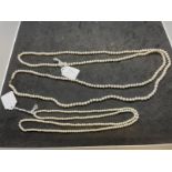 Jewellery: Necklet, single row of cultured pearls. Length 36ins. Plus necklet, single row of