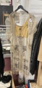 1920s/30s Fashion: Flapper dress, lemon colour bodice, tulle skirt with bead fringe, split to