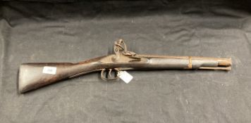 Antique Weapons: Flintlock short rifle, possibly North Indian Tribal, length 24½ins. Plus percussion