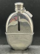 Hallmarked Silver: Hip flask with liner of oval shape, London 1881 Mordan & Co. 5¼ins. x 3¼ins.