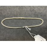 Jewellery: Necklet single row of (89) graduated cultured pearls attached to a 9ct white gold