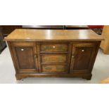 18th cent. Oak dresser base, the top with moulded edge 3 central short drawers flanked by 2