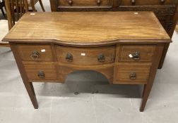 Edwardian mahogany semi bow front inlaid desk, central bow fronted drawer flanked by 2 short drawers