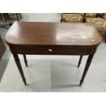 Early 19th cent. Mahogany tea table on turned ring supports. 35¼ins. x 17¼ins. x 34½ins.
