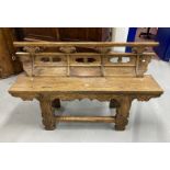 Chinese elm bench with weathered finish, shaped panelled back solid seat on shaped cut out legs with