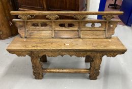 Chinese elm bench with weathered finish, shaped panelled back solid seat on shaped cut out legs with