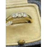 Hallmarked Jewellery: 18ct gold ring set with three brilliant cut diamonds, estimated weight of (
