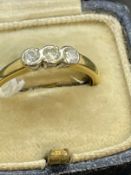 Hallmarked Jewellery: 18ct gold ring set with three brilliant cut diamonds, estimated weight of (