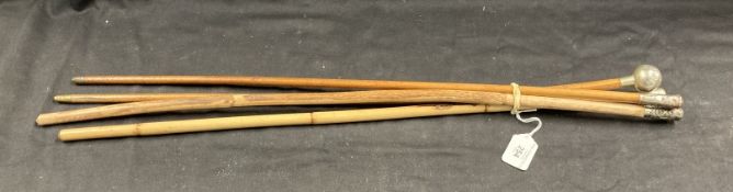 Militaria: Swagger sticks. Group of four including Royal Scots, London, London Scottish, London