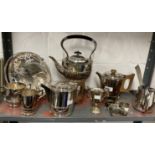 Silver plated items to include spirit kettle, four piece Art Deco tea set, fruit basket, napkin