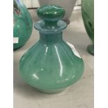 The Mavis and John Wareham Collection: Monart perfume bottle green with self colour stopper. Label