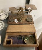 Scientific Instruments: 20th cent. Brass postal scales and a hanging balance. (2)