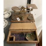 Scientific Instruments: 20th cent. Brass postal scales and a hanging balance. (2)