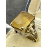 Jewellery: Yellow metal ring set with a 15.8mm x 11.8mm rectangular cut citrine,ring stamped 9ct,