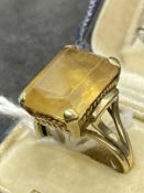Jewellery: Yellow metal ring set with a 15.8mm x 11.8mm rectangular cut citrine,ring stamped 9ct,