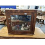 Late 19th/early 20th cent. Pine cupboard with glass door and sides, single shelf. Contents to