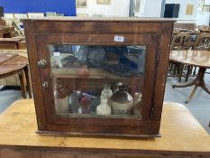 Late 19th/early 20th cent. Pine cupboard with glass door and sides, single shelf. Contents to