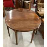 Edwardian demi-lune mahogany dining table, moulded edge on square tapered legs & spade feet with one