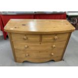 19th cent. Pine bow front chest of four drawers, two short over two long drawers with knob handles