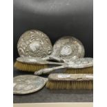 Hallmarked Silver: Silver backed hand mirrors x 3, silver backed hairbrushes x 3. (6)
