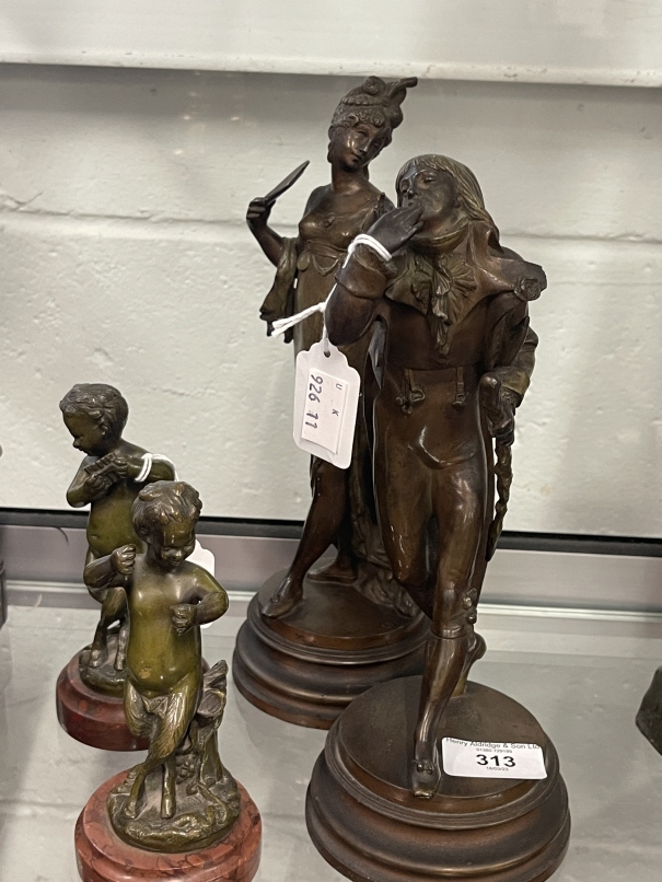 Metalware: 19th cent. pair of French metal figures, lady with a fan and a gentleman blowing her a - Image 2 of 2