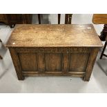 20th cent. Oak Jacobean coffer hinged lid, carved frieze above a three panel front on stile feet.