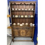 20th cent. Oak dresser, the rack with shaped frieze, two shelves, the base with two short drawers