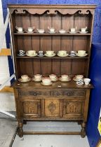 20th cent. Oak dresser, the rack with shaped frieze, two shelves, the base with two short drawers
