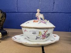 19th cent. Ceramics: Meissen tureen decorated with flowers and applied figure of a child and fruit
