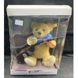 Toys: Steiff Musical Bear with guitar and music box, boxed.
