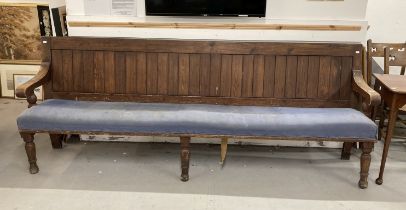 Late 19th cent. Pine bench tongue and groove back, scroll arms, upholstered seat on three turned