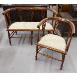 Edwardian mahogany tub shaped settee & matching chair. The back with pierced splats, turned