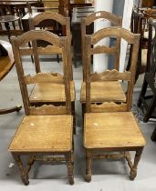 19th cent. Oak country chairs, shaped top rail, open backs with shaped bar across solid seats,