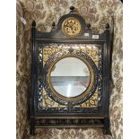 Late 19th cent. Aesthetic ebonised and gilt wall mirror, removable panel with pierced fretwork,