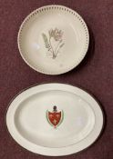 Ceramics: 19th cent. Oval cream ware dish with a armorial to the centre. Small chip to back of rim