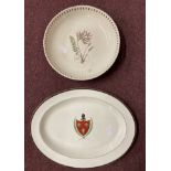 Ceramics: 19th cent. Oval cream ware dish with a armorial to the centre. Small chip to back of rim