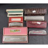 Musical Instruments: Collection of five Hohner harmonicas, all cased. (5)