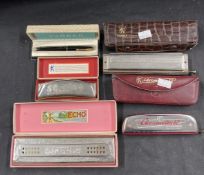 Musical Instruments: Collection of five Hohner harmonicas, all cased. (5)