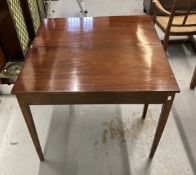 19th cent. Mahogany tea table, the rectangular top with reeded edge on squared tapered legs.
