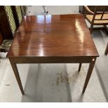 19th cent. Mahogany tea table, the rectangular top with reeded edge on squared tapered legs.