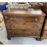 19th cent. Mahogany chest three long drawers brass handles on bracket feet. 43ins. x 21½ins. x