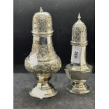 Hallmarked Silver: Sugar sifters one octagonal shaped and one bulbous with scroll decoration. One