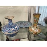 Pottery: Indian Bombay School of Art pottery vases one slip painted earthenware round body with a